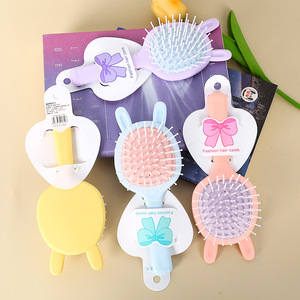 Peigne de massage à coussin d'air, grand peigne à cheveux portable en plastique pour voyage, design de dessin animé, couleur thé au lait - Product Image 1
