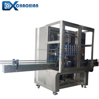 Machine d'embouteillage automatique à têtes multiples 40BPM Bouteilles de 500ml avec bouchon rabattable Remplisseuse de liquide automatique