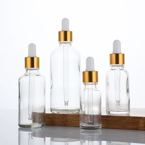 Flaconi Contagocce in <span class=keywords><strong>Vetro</strong></span> <span class=keywords><strong>Trasparente</strong></span> di Lusso da 50ml all'Ingrosso, Logo Personalizzato per Oli Essenziali Cosmetici, Confezione <span class=keywords><strong>Trasparente</strong></span> in Scatola - Product Image 3