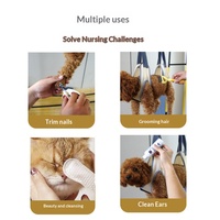 Hamac de toilettage suspendu populaire pour animaux de compagnie, anti-morsure et anti-griffures, pour chiens et chats, pour le bain et la coupe des ongles, en tissu non tissé, avec ceinture de maintien pour la taille