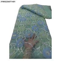 Tissu en dentelle de tulle brodé de fleurs et de perles pour robe de mariée