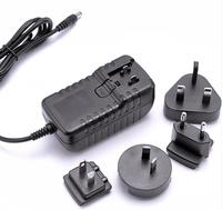 Adaptador de CA y CC EU US AU UK Enchufe intercambiable Modo de conmutación Fuente de alimentación Enchufe de pared 5V 6V 7,5 V 9V 12V 15V 18V 24V 1A 2A 4A 12W