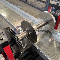 Petit pain de Purlin C/Z en acier à grande vitesse d'épaisseur de BSY 4MM formant la Machine composants entièrement automatiques de noyau de roulement d'engrenage d'utilisation de plancher
