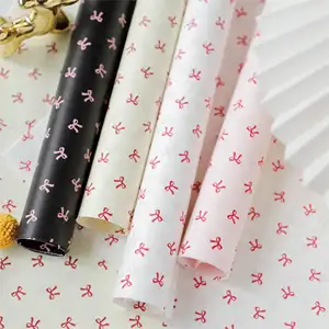 Luxury 38GSM 50*70cm bowknot pattern printing tissue paper gift flower wrap paper for flower gift shop