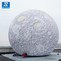 Planète gonflable géante Lune rougeoyante Installation d'art de lumière gonflable flottant sur l'eau