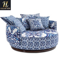 Canapé pivotant rond de luxe moderne en tissu à motifs de porcelaine bleue et blanche de qualité supérieure pour villas ou hôtels