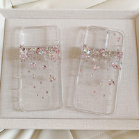 Étui antichoc élégant de style niche, transparent avec accents de diamants, pour 17 Pro Max, deux-en-un, bords souples, dos rigide en acrylique, fait main