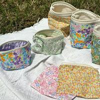 Prix bas Printemps Motif Floral Mignon Mini Pochette Logo Personnalisé Qualité Cosmétique Sac Voyage Maquillage Sac