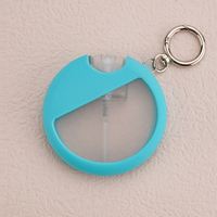 Bouteille de parfum vaporisateur de poche pour carte de crédit de forme ronde de 25ml avec couvercle en silicone