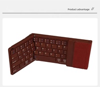 Mini clavier pliable BT sans fil ultra mince pavé tactile fonction numérique clavier de téléphone portable à double mode pour ordinateur