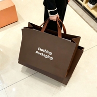 Sacs shopping en papier argenté avec logo personnalisé, brillants et réfléchissants, avec poignée pour le shopping