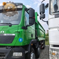 Camion tracteur HOWO TX400 d'occasion, également disponible : HOWO TX371, TX430 en stock. Camions lourds d'occasion Shaanxi Delong, Sany, Caterpillar, Komatsu.