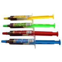 Jouets de bonbons pour enfants Snacks Chocolat Vente en gros Emballage en forme de seringue Chocolat blanc au lait