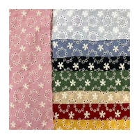 Vente en gros dubai net lacets tissu coton oeillet tissu broderie pour robe de dame