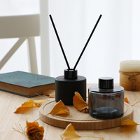 Flacon diffuseur en verre noir mat de luxe, forme cylindrique, 50 ml, 100 ml, 150 ml, 200 ml, avec différents couvercles et boîtes, vente en gros