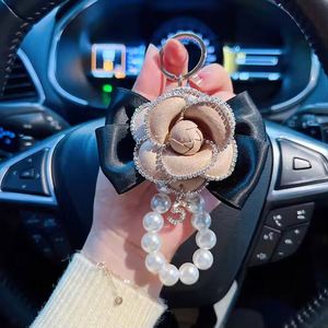 Breloque de sac en PU style coréen avec fleur de camélia et perles, accessoires porte-clés de voiture, pendentif de téléphone pour femme, décoration, cadeau de vacances - Product Image 6