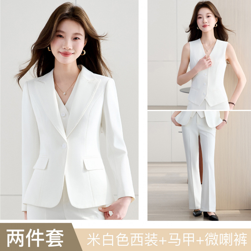 Off-white suit vest with flared trousers