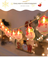 Weihnachtliche Atmosphäre-Dekorationen: Weihnachtsmann-LED-Lichterketten, Tigerförmiger Weihnachtsbaum und Gemischte Kunstlichterketten