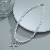 Nouveau à la mode Imitation perle perlée creux étoile pendentif collier Simple décontracté personnalité conception colliers de perles