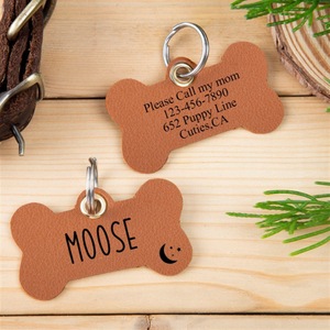 Etiquetas de identificación de perro de cuero portátil Etiquetas de nombre de perro con forma de hueso de PU Etiquetas de <span class=keywords><strong>collar</strong></span> de mascota en blanco - Product Image 4