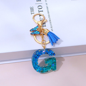 Llavero de acrílico con borla de mariposa de alta calidad y letras A-Z, accesorios de llavero de nueva llegada para mujer, dijes para bolso hechos de plástico - Product Image 6