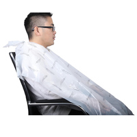 Cape jetable en plastique PE imperméable de barbier de coiffure de salon de coiffure en gros d'usine bavoir jetable