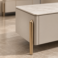 Ensemble de meuble TV et table basse WYRAX en deux pièces avec dessus aspect marbre blanc, coins arrondis, pieds dorés et rangement