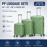 Valise de voyage rigide en PP vert menthe, prête pour l'audit d'usine, roues pivotantes, texture ondulée, poignée latérale, assortiment de vente au détail ODM