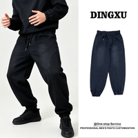 Jean délavé homme gris foncé, taille élastique, coupe ample, poches plaquées, bas de jambe élastiques, cordon de serrage