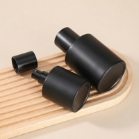Vente en gros en stock – Élégant vaporisateur cylindrique noir en verre, vide et rechargeable, pour échantillons de parfum et de soins de la peau, avec sérigraphie
