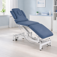 Table d'examen hospitalière pour lit de traitement médical, dossier réglable, rembourrage confortable et roues verrouillables
