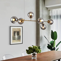 Lustre suspendu en verre LED de couleur or, design moderne et luxueux, fabriqué sur mesure par DLSS, avec structure en fer, pour salon et maison.