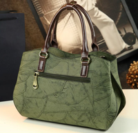 Cadeau pour maman : Nouveau sac à main élégant de style chinois pour femme, collection automne-hiver 2026, grande capacité, à porter à la main ou en bandoulière, avec pompon, idéal pour le quotidien.