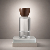 Flacon de parfum de luxe personnalisé en verre cylindrique haut de gamme avec base lourde et bouchon en bois, vente en gros d'usine