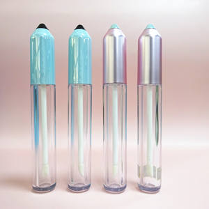 การออกแบบใหม่โปร่งใสรูปร่างที่ไม่ซ้ํากันหลอดลิปกลอสกระสุนดินสอรูปร่างด้านบนขายส่งโลโก้ที่กําหนดเองสีหลอดกลม - Product Image 1