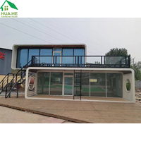 Maisons modulaires écologiques modernes meublées, maisons capsules, cabines Apple pour utilisation en hôtel de luxe, en kit