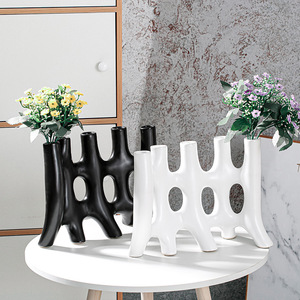 Jarrón de cerámica abstracto decorativo creativo con sentido distintivo y avanzado, decoración del <span class=keywords><strong>hogar</strong></span> de la sala de estar de estilo Ins - Product Image 1