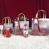 Sac fourre-tout en PP/PVC givré transparent avec poignée et ruban, personnalisé avec logo, idéal pour cadeaux de mariage, vente en gros