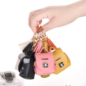 PU deri kulaklık sırt çantası anahtarlık pembe turuncu zeytin saklama çantası promosyon hediye anahtarlık kulaklık anahtarlık
