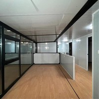 Maison conteneur modulaire extensible de 20 pieds à construction rapide, en panneaux sandwich, préfabriquée, pour camping, mini-maison, bureau, hôtels, centres commerciaux, design moderne