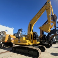 Excavatrice sur chenilles hydraulique Komatsu PC210LC d'occasion, 21 tonnes, d'origine japonaise, pour travaux de terrassement, carrière et démolition, avec moteur et engrenages.