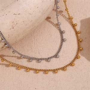 Collier ras du cou tendance avec pampilles perlées, style bohème, en acier inoxydable plaqué or 18 carats PVD pour femme - Product Image 1
