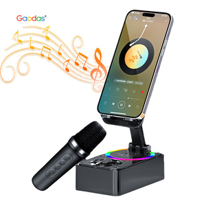 All-in-One Wireless <b>Microphone</b> Speaker Charges Mobile Phone with Holder Feature - Product Image 1