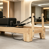 Pilates Reformer avec cadre en bois, barre de repose-pieds réglable, résistance à ressort robuste, pour salle de sport à domicile et studio de fitness