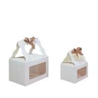 Boîte d'emballage cadeau transparente gaufrée pliable avec nœud décoratif et longue poignée pour gâteaux mousse, chocolats et bonbons - Vente en gros