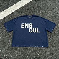 T-shirt personnalisé en coton lourd, coupe courte et ample pour hommes |   T-shirt Streetwear Oversize avec Détail de Bordure à Rivets Métalliques et Impression 3D en Relief OEM ODM
