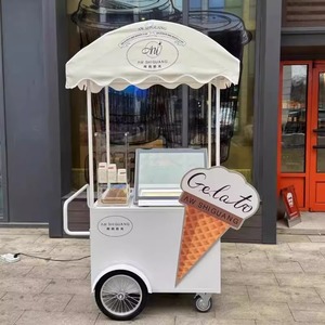 Chariot de vente ambulant compact pour desserts glacés, avec grande capacité de rangement et auvent résistant aux intempéries, idéal pour parcs, plages et activités commerciales. - Product Image 1