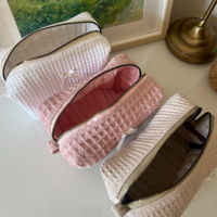 Pochette cosmétique texturée Coquette Waffle, couleur unie, mini nœud, fermeture éclair dorée, sac de rangement portable pour maquillage, cadeau pour femme