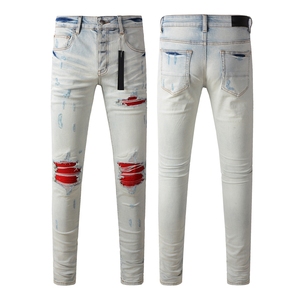 AMIRY Jeans slim stretch pour hommes, vente en gros de patchs rouges déchirés et délavés, style de rue pour l'hiver, l'automne et l'été - Product Image 1
