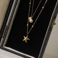 À la mode nouveau été femmes mode bijoux accessoires cadeaux perle étoile de mer coquille pendentif en acier inoxydable Double 2 couches collier